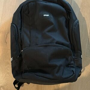 Oakley Back Pack. Brand New With Tags. Lots of great storage pockets!